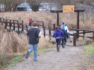 In teams, students race around their school to complete gps challenge race